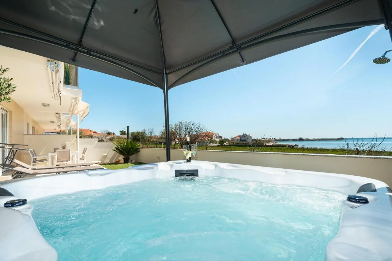 Beachfront Reiterer Villa V1 With Jacuzzi 30 Meters From The Beach - Crowonder Luxury Rent Privlaka  Croatia